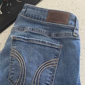 Hollister Blue Denim with Brown Leather Patch